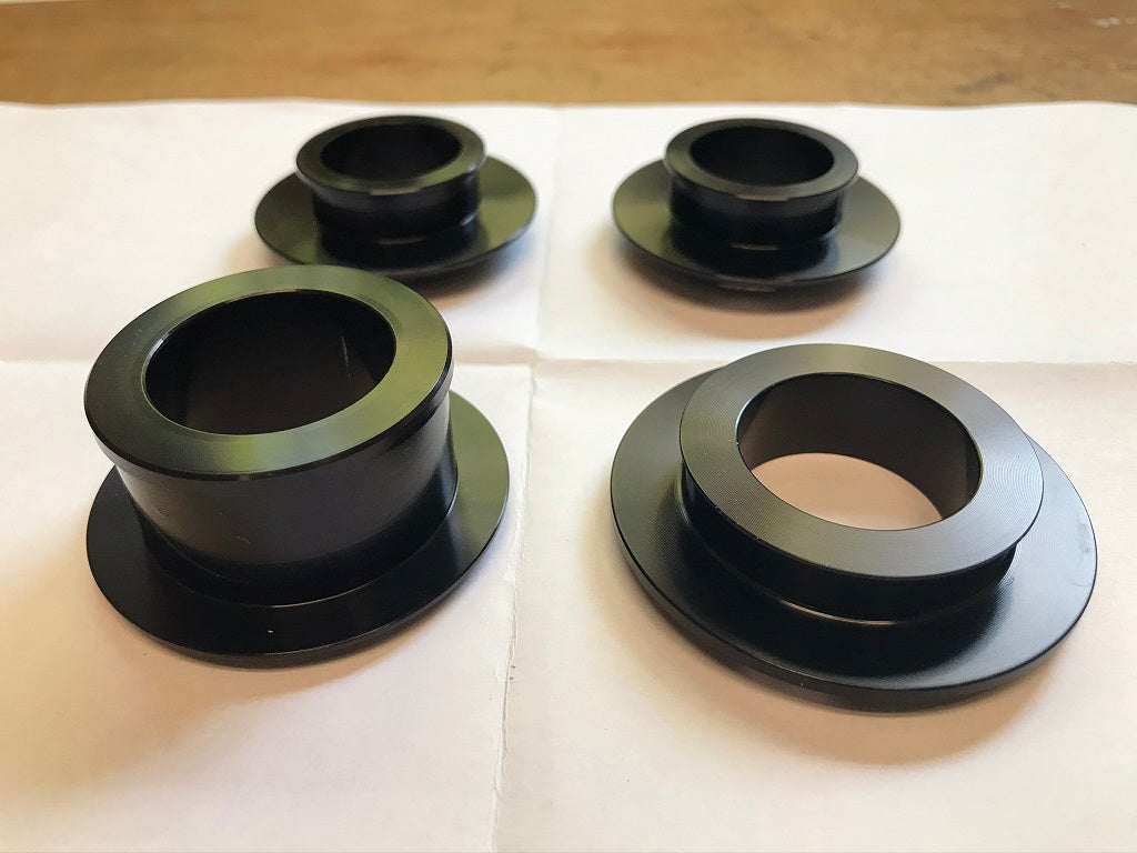 R1 2015-2026 captive wheel spacer set