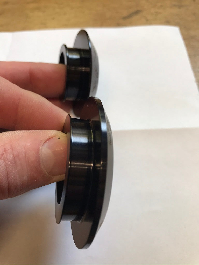 R1 2015-2026 captive wheel spacer set